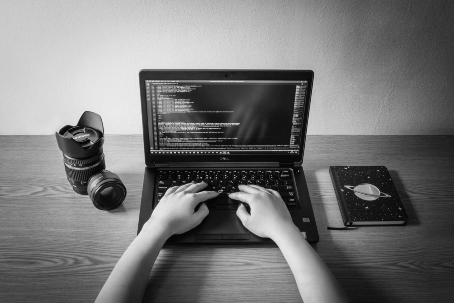 Developer reviewing mobile app analytics and performance data
